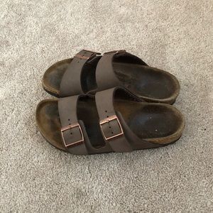 Brown and copper Birkenstock sandals